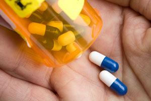 Pills in someone's hand